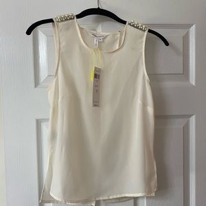 NWT BCBGeneration Sleeveless Pearl Blouse
Size: XS